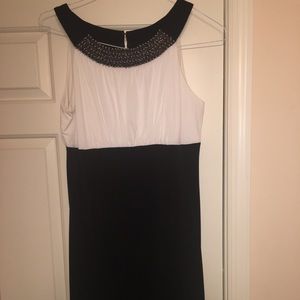 Women’s dress with beaded neckline